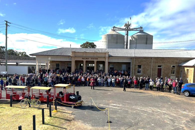 Community photo being taken at the re-opening of the Warwick Railway station on June 21.