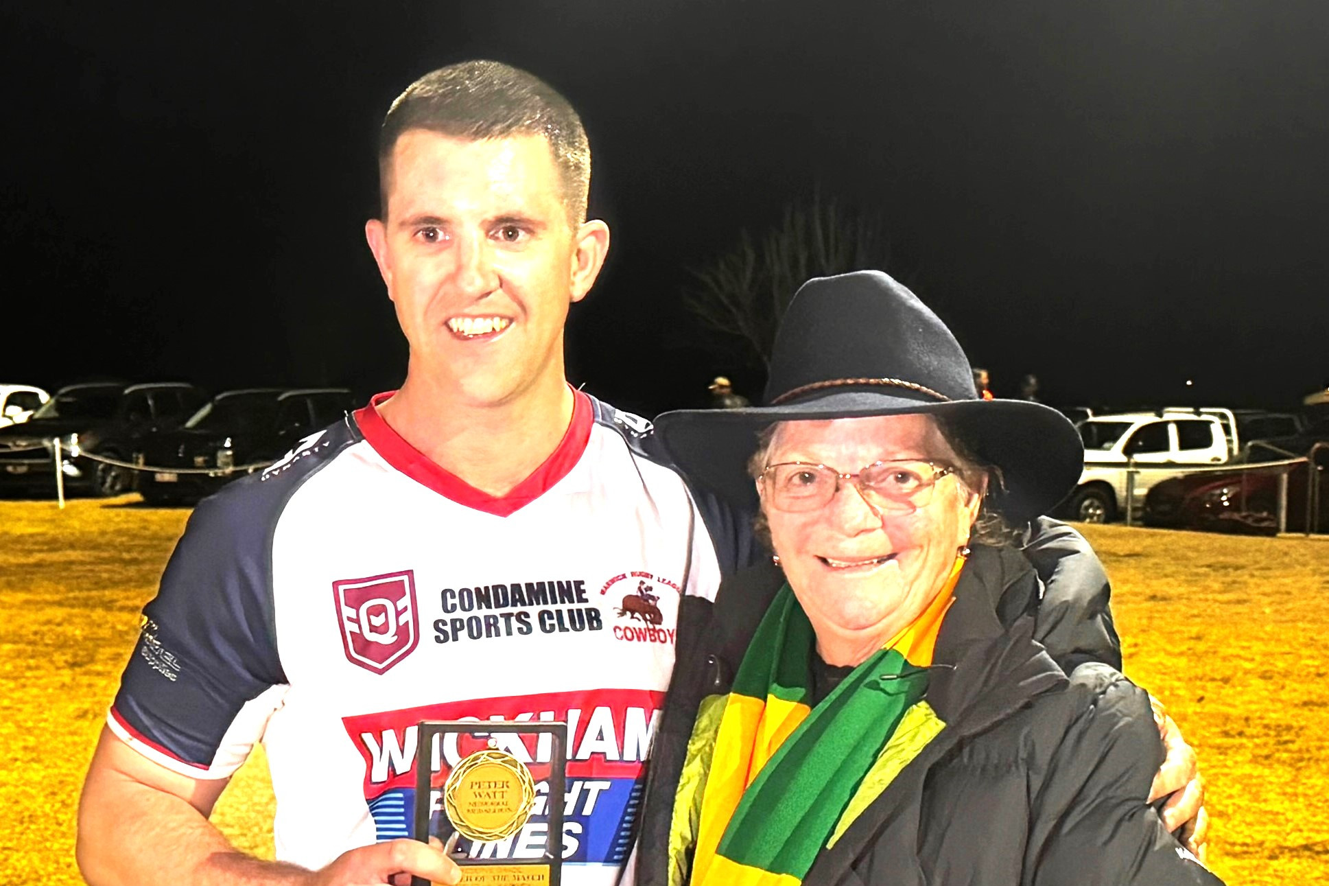 Warwick Cowboys hooker and reserve grade Man of the Match against Wattles on Saturday Morgan Taylor is presented with the Peter Watt Memorial Medallion by Mrs Shelley Duggan on behalf of the Watt family.