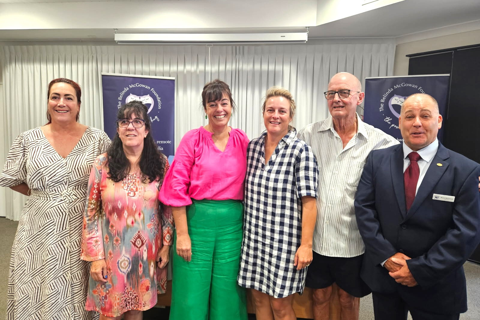 The McMurtrie family with Bruce McGowan (far right) from the Belinda McGowan Foundation, including (from left) her children, Jules McMurtrie, Kylie Stoneman, Jen Wren, and Jamie Bennett, and Mally McMurtrie's husband, David.